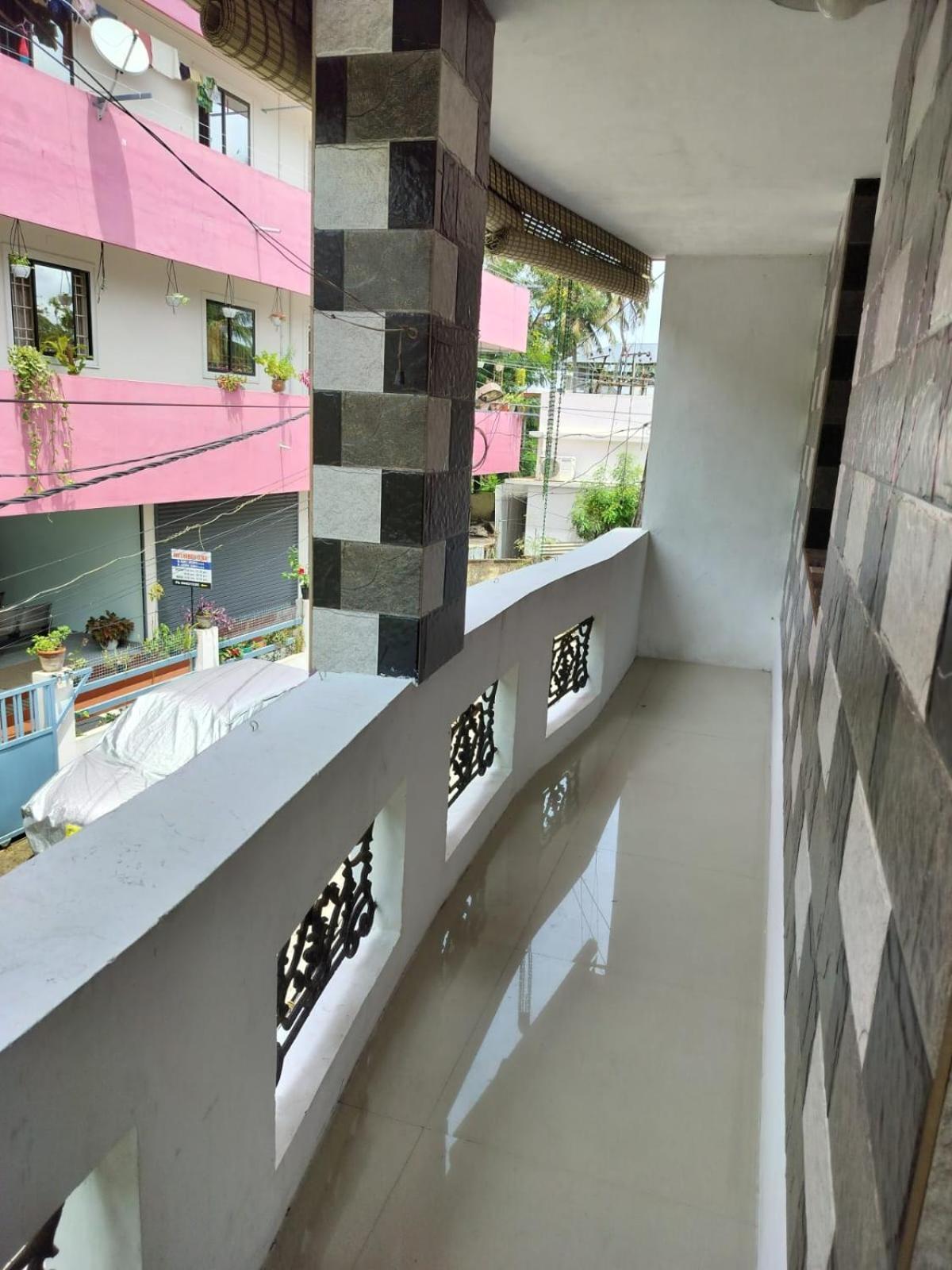 Cozy Haven Apartamento Kochi Exterior foto
